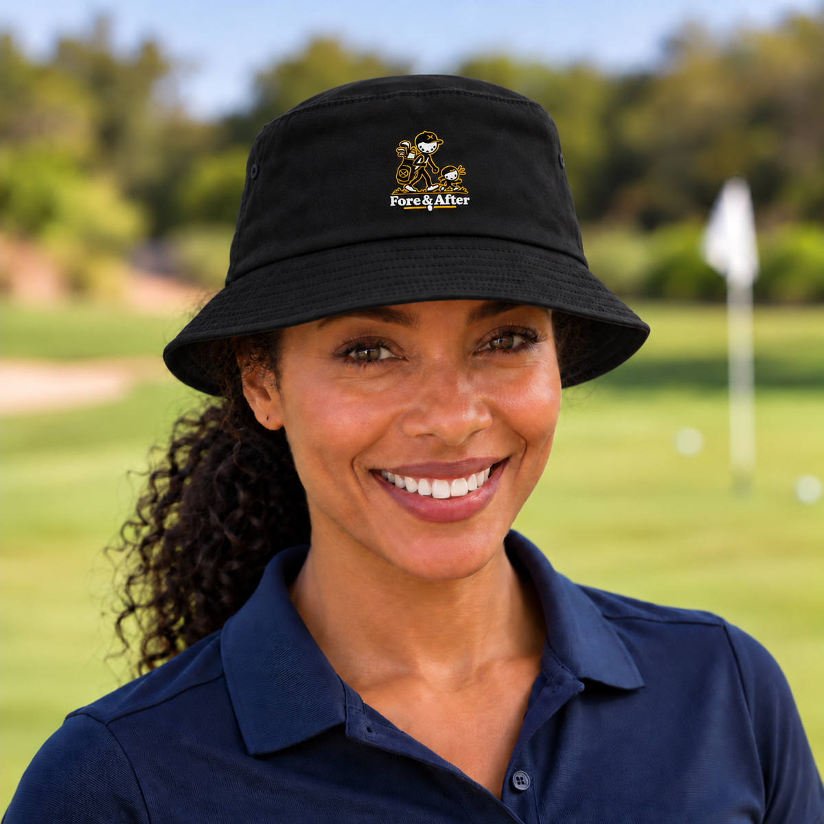 The Fore & After Bucket Hat in black — front golf lifestyle view