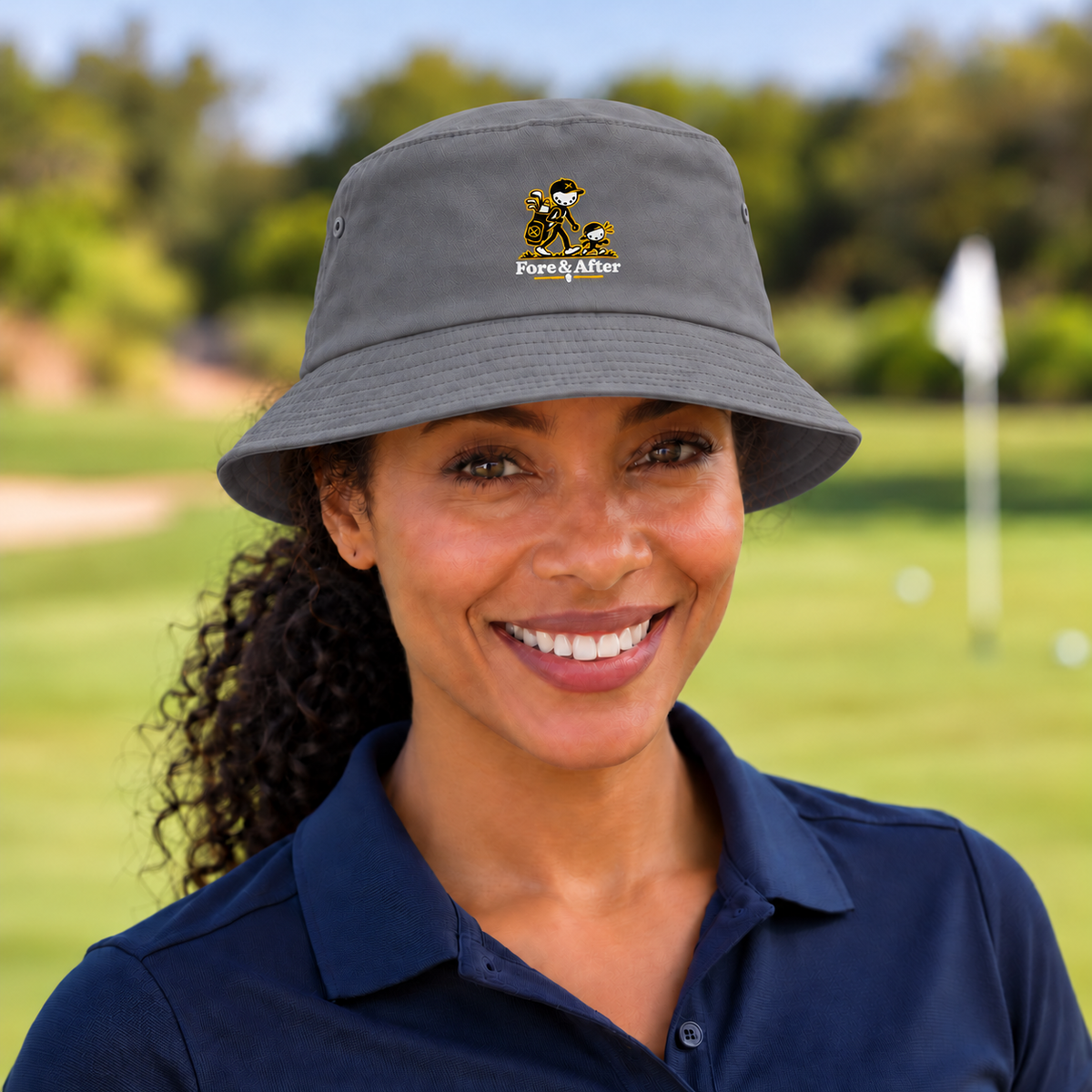 The Fore & After Bucket Hat in grey — front golf lifestyle view