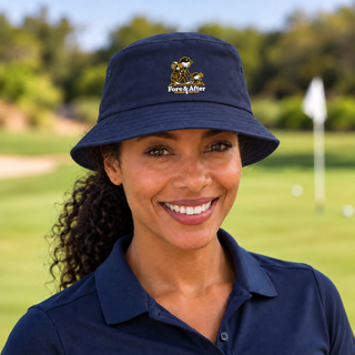 The Fore & After Bucket Hat in navy — front golf lifestyle view