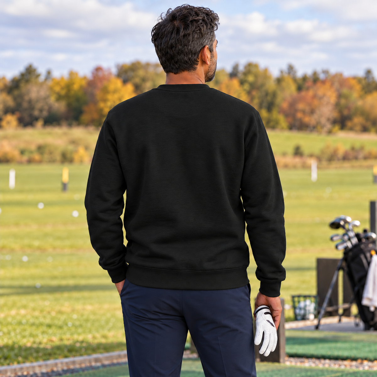 The Fore & After Sweatshirt in black — back golf lifestyle view
