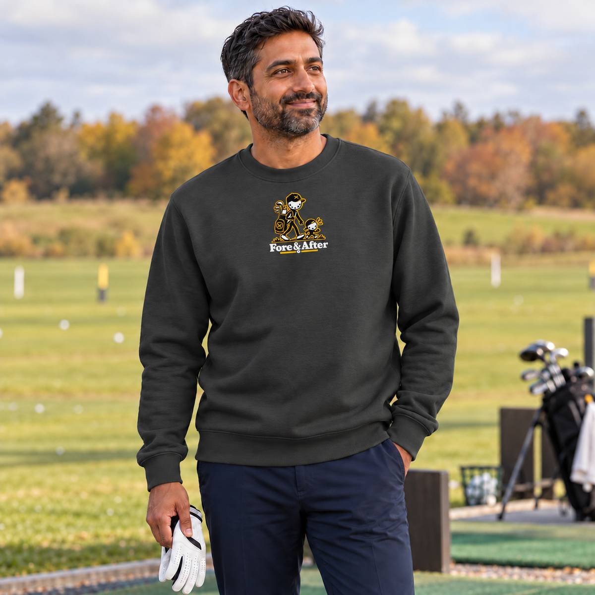 The Fore & After Sweatshirt in vintage black — front golf lifestyle view
